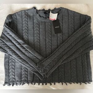 Ladies cable knit sweater with small fringe